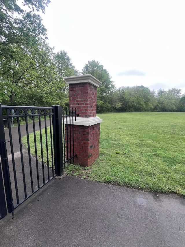 3201 Aspen Grove Dr Unit D3, Franklin, TN 37067 - gate featuring a yard