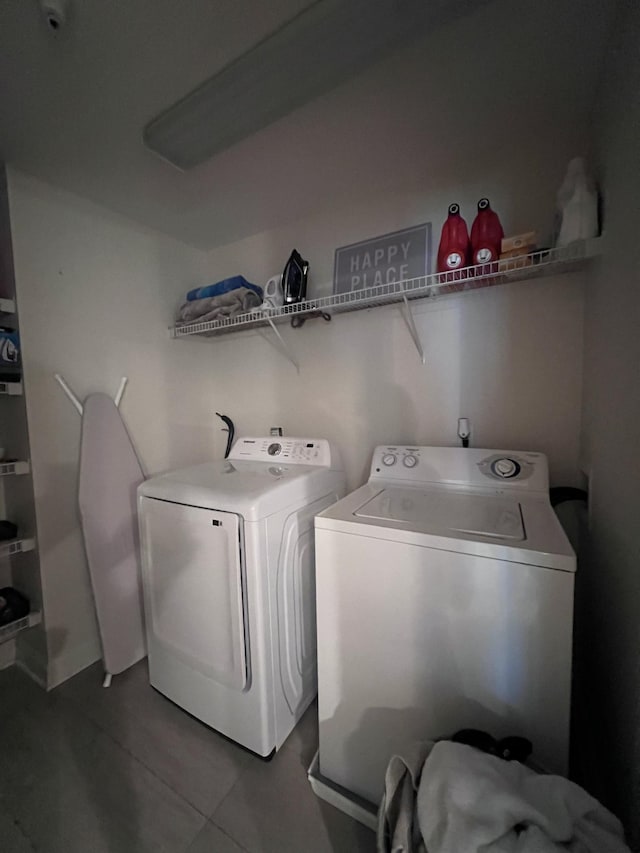 3201 Aspen Grove Dr Unit D3, Franklin, TN 37067 - laundry room featuring washing machine and dryer and tile patterned floors