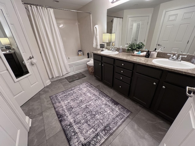 3201 Aspen Grove Dr Unit D3, Franklin, TN 37067 - bathroom featuring shower / bath combo with shower curtain, double vanity, and marble finish floors