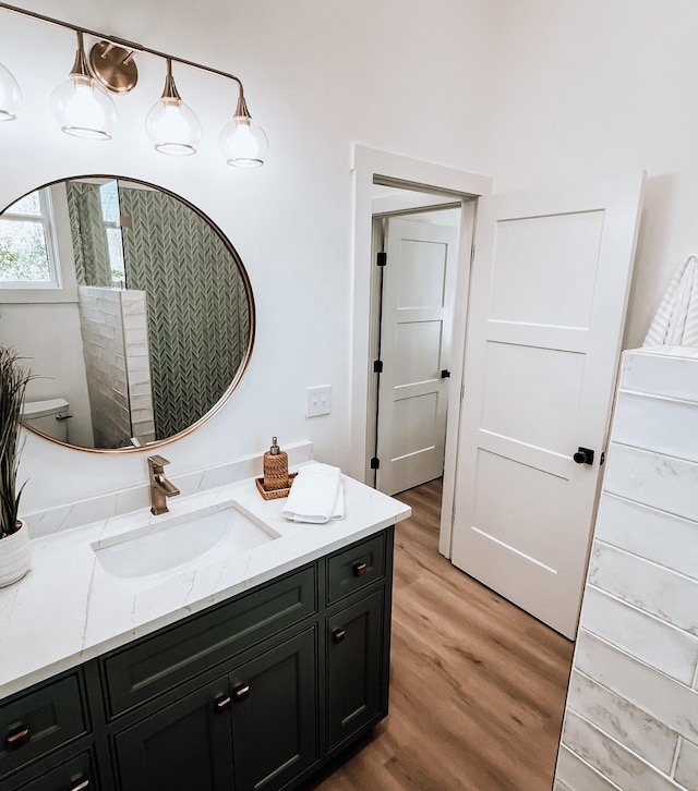 135 Hemlock Cv, Tracy City, TN 37387 - bathroom featuring wood finished floors and vanity