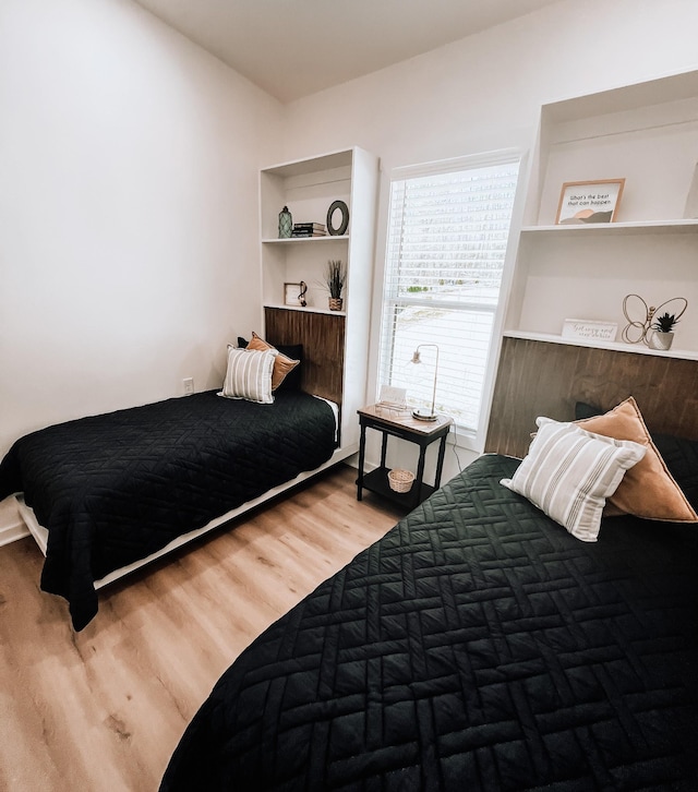135 Hemlock Cv, Tracy City, TN 37387 - bedroom featuring wood finished floors