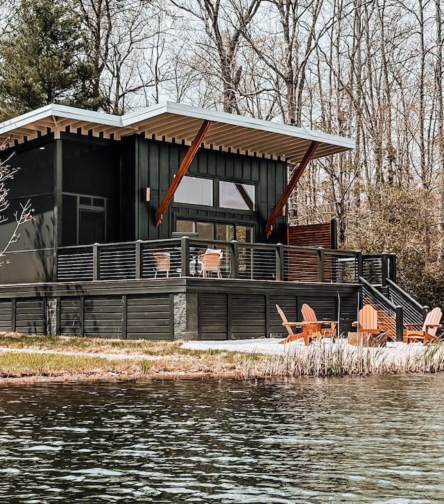 135 Hemlock Cv, Tracy City, TN 37387 - rear view of property with a water view and board and batten siding