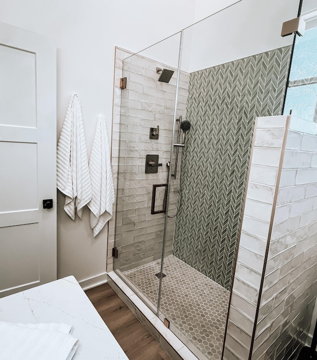 135 Hemlock Cv, Tracy City, TN 37387 - full bathroom featuring a walk in shower, baseboards, and wood finished floors