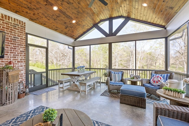 sunroom featuring plenty of natural light, ceiling fan, and an outdoor hangout area