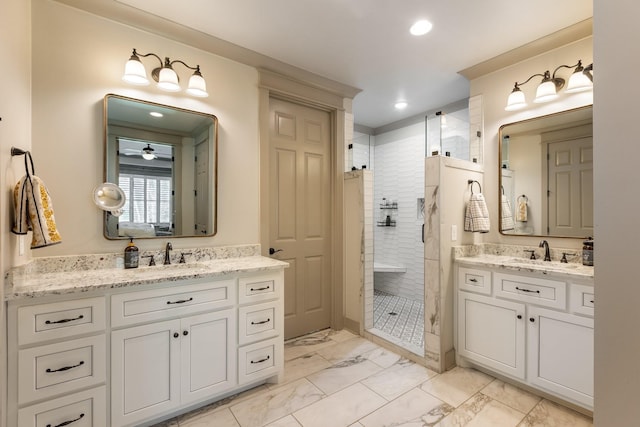 bathroom featuring a walk in shower, marble finish floor, and a sink