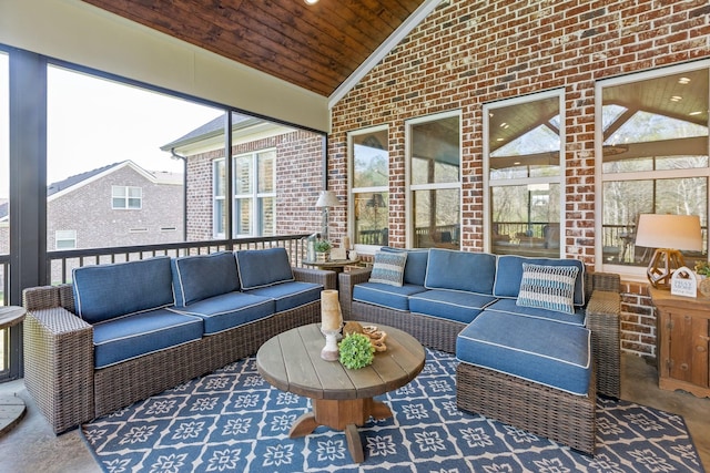 sunroom / solarium with outdoor lounge area and a healthy amount of sunlight