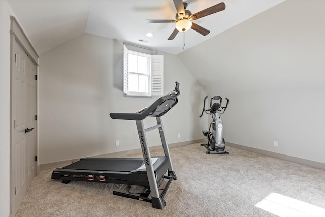 exercise area featuring vaulted ceiling, ceiling fan, and carpet