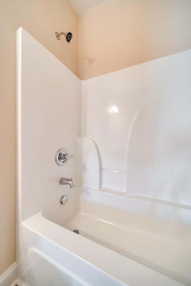 full bath featuring bathtub / shower combination