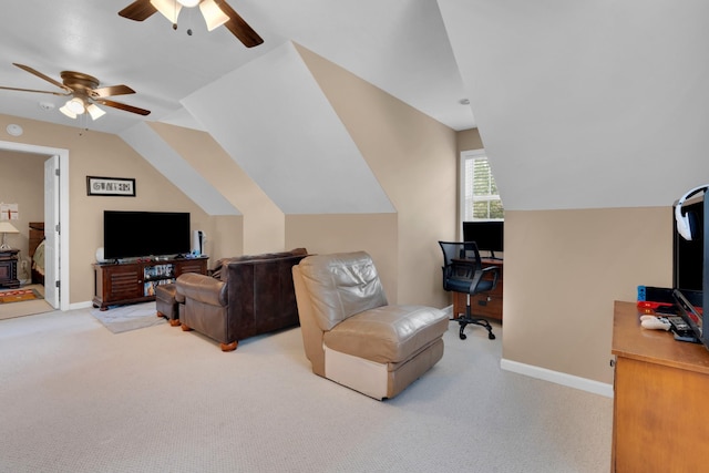 living room with a ceiling fan, lofted ceiling, carpet floors, and baseboards