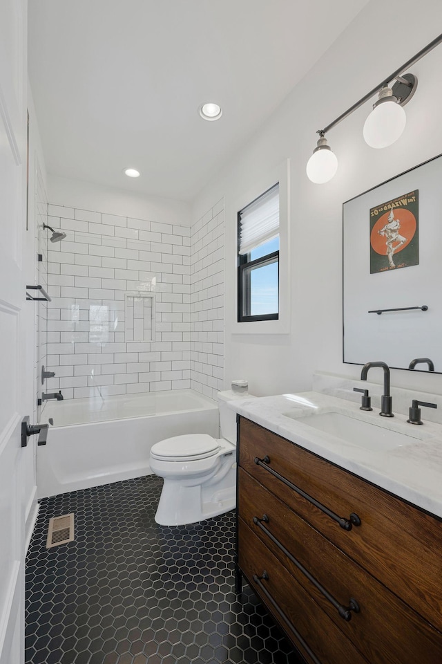 bathroom with toilet, vanity, shower / washtub combination, tile patterned flooring, and recessed lighting