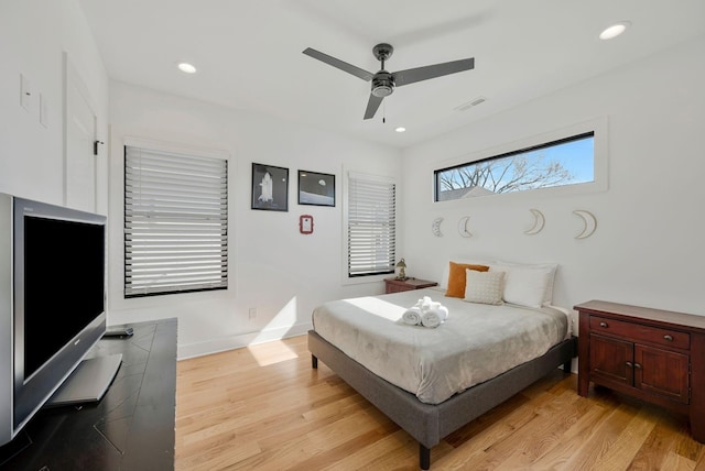 bedroom with light wood-style flooring, baseboards, recessed lighting, and ceiling fan