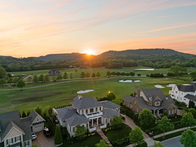6302 Wild Heron Way, College Grove, TN 37046 - aerial view at dusk featuring a mountain view and golf course view