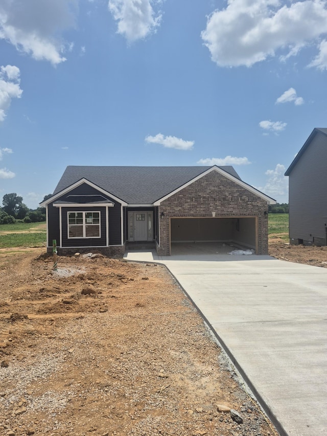 5 Hugh Hunter Rd, Oak Grove, KY 42262 - ranch-style home featuring an attached garage, driveway, and brick siding