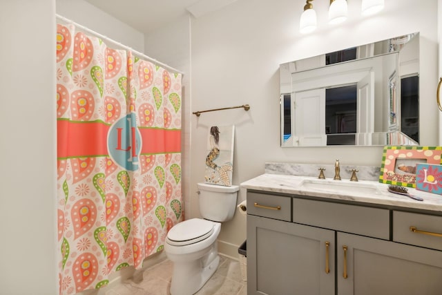 bathroom with toilet, curtained shower, tile patterned flooring, and vanity