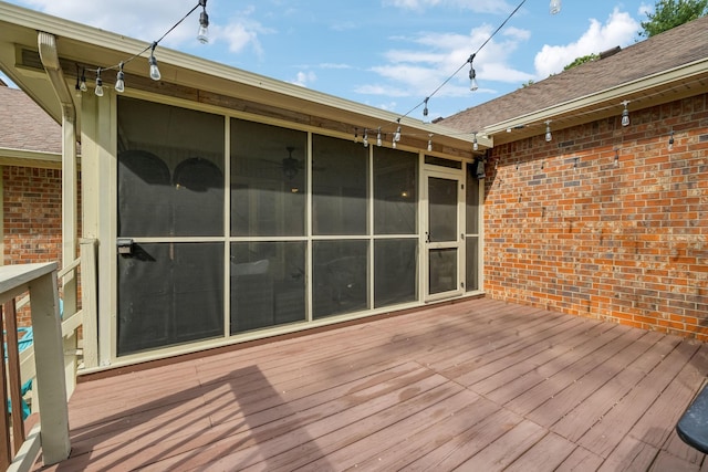 wooden terrace with a sunroom