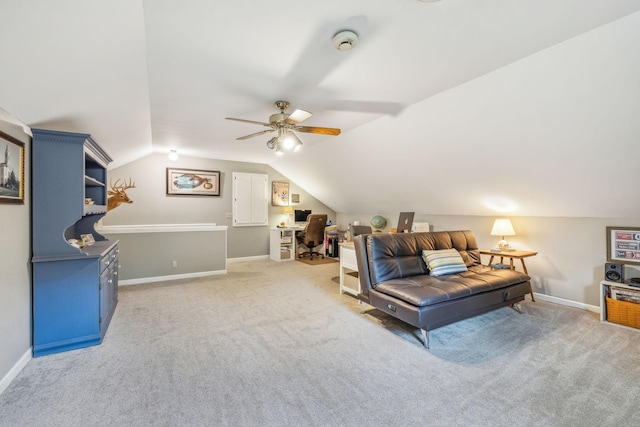 living room featuring baseboards, lofted ceiling, light colored carpet, and ceiling fan