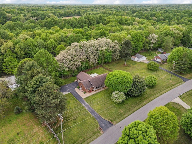 drone / aerial view with a view of trees