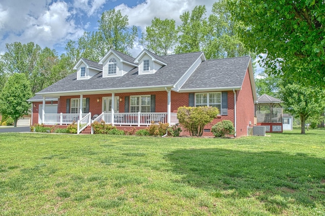 cape cod house with central AC unit, a front lawn, roof with shingles, a porch, and brick siding