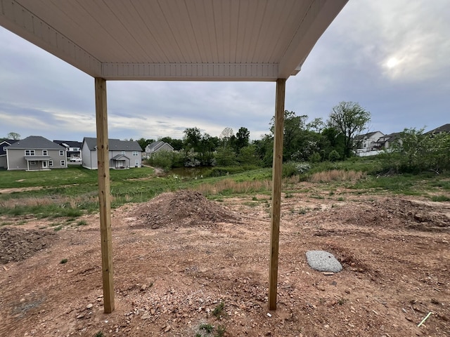 view of yard featuring a residential view