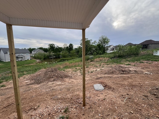 view of yard featuring a residential view