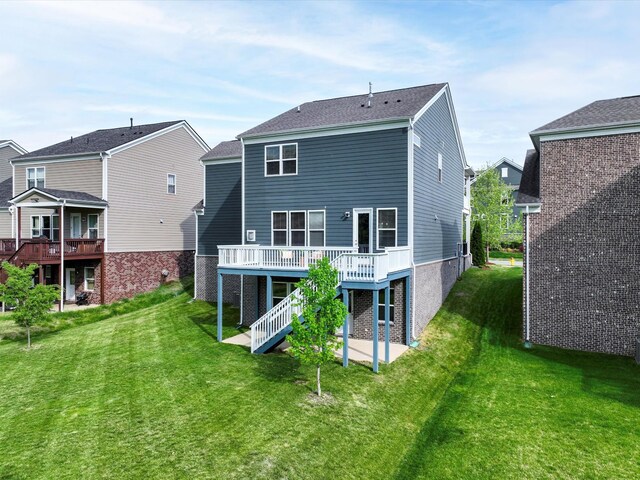 1068 Amelia Park Dr, Franklin, TN 37067 - back of property featuring a lawn, stairway, a deck, and a patio