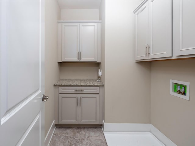 1068 Amelia Park Dr, Franklin, TN 37067 - washroom featuring cabinet space, washer hookup, and baseboards
