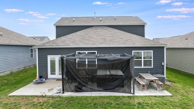 615 Pine Bloom Rd, Lebanon, TN 37087 - back of property with central air condition unit, a patio area, a lawn, and a shingled roof