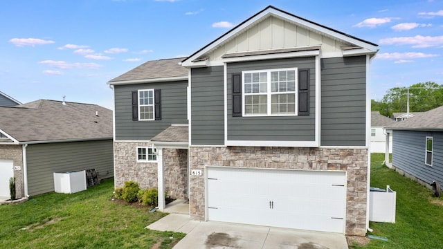 615 Pine Bloom Rd, Lebanon, TN 37087 - view of front of house featuring a garage, stone siding, a front lawn, and concrete driveway