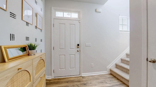 615 Pine Bloom Rd, Lebanon, TN 37087 - foyer with stairs, a healthy amount of sunlight, wood finished floors, and baseboards