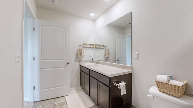 615 Pine Bloom Rd, Lebanon, TN 37087 - half bath featuring toilet, vanity, visible vents, and baseboards