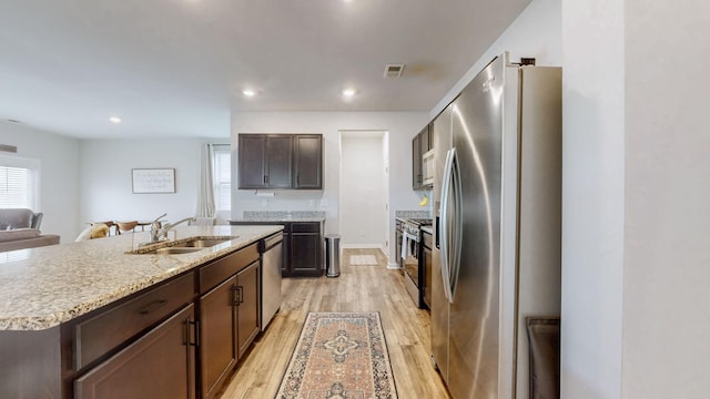615 Pine Bloom Rd, Lebanon, TN 37087 - kitchen with plenty of natural light, light wood-style flooring, a sink, and appliances with stainless steel finishes
