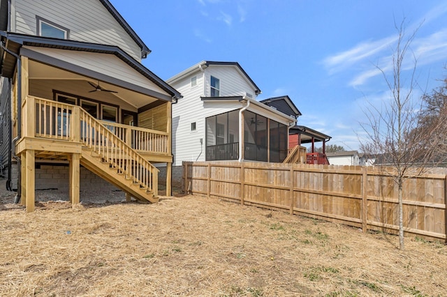 620 Waco Dr Unit B, Nashville, TN 37209 - back of property with fence, a ceiling fan, a sunroom, and stairs