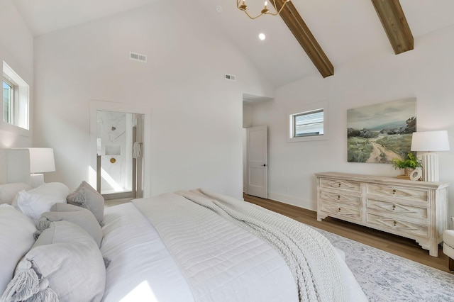 620 Waco Dr Unit B, Nashville, TN 37209 - bedroom with dark wood finished floors, visible vents, multiple windows, and high vaulted ceiling