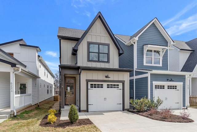 620 Waco Dr Unit B, Nashville, TN 37209 - view of front of home with driveway, an attached garage, board and batten siding, and roof with shingles