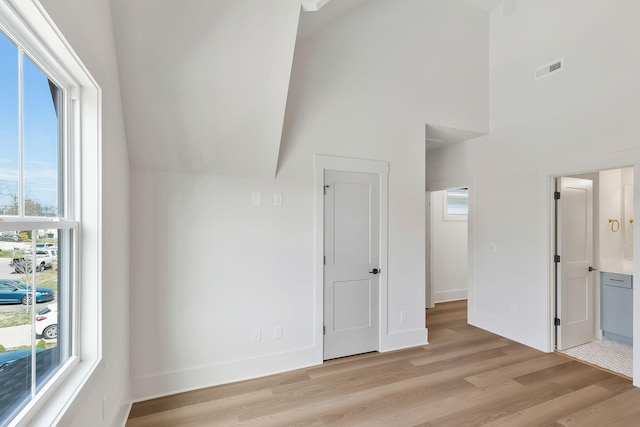 620 Waco Dr Unit B, Nashville, TN 37209 - interior space featuring a towering ceiling, visible vents, light wood-style flooring, and baseboards