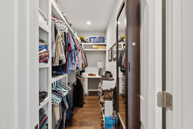spacious closet with wood finished floors