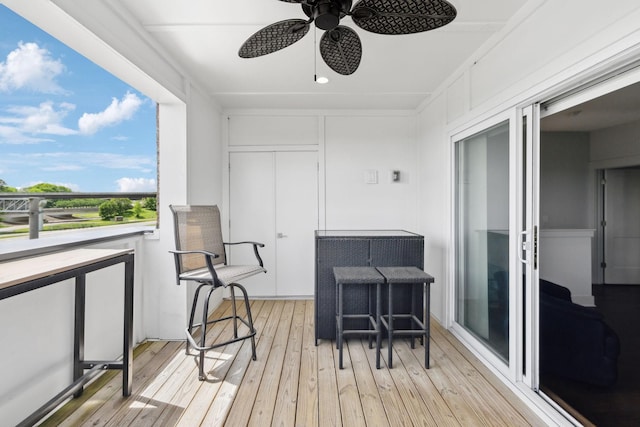 balcony featuring a ceiling fan