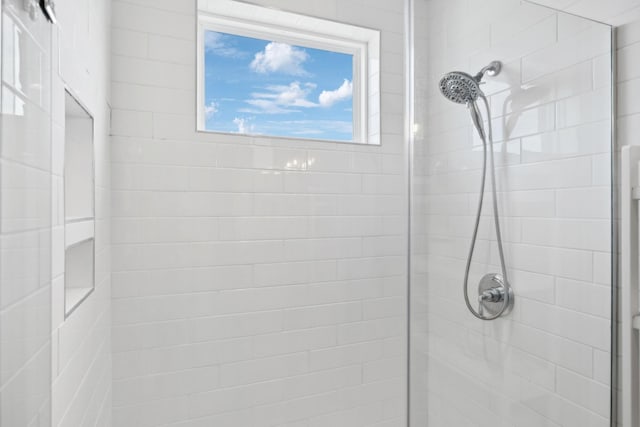 bathroom featuring a stall shower