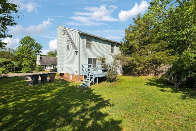 view of side of home with a chimney and a yard