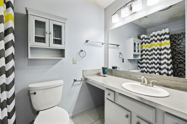 full bath with baseboards, vanity, toilet, marble finish floor, and a shower with shower curtain