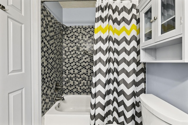 full bathroom featuring toilet and shower / tub combo