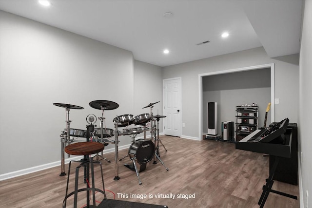 7327 Hunting Camp Rd, Fairview, TN 37062 - recreation room with baseboards, recessed lighting, visible vents, and wood finished floors