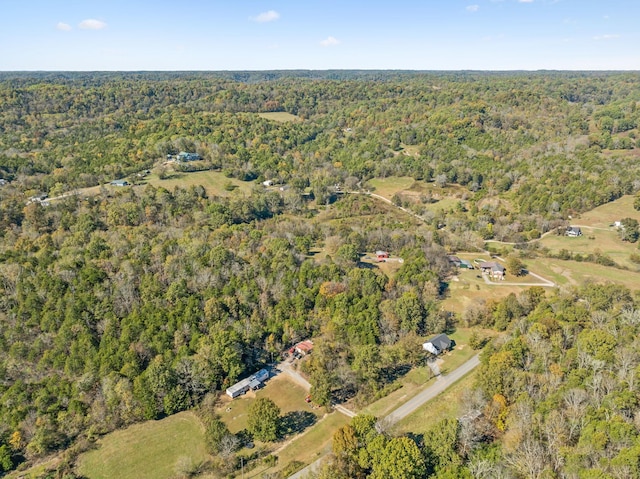 bird's eye view featuring a view of trees