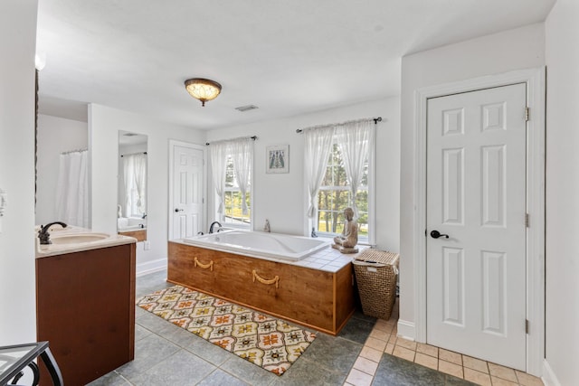 full bath with a bath, tile patterned flooring, visible vents, and vanity