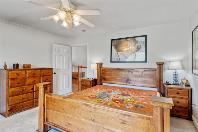 bedroom with light colored carpet