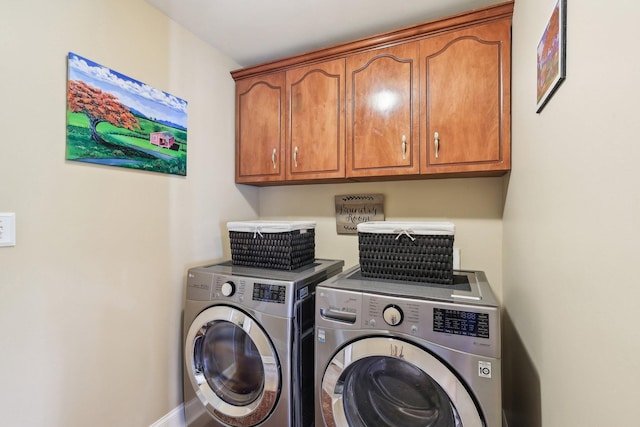 4025 Moore Hollow Rd, Woodlawn, TN 37191 - washroom with washing machine and clothes dryer and cabinet space