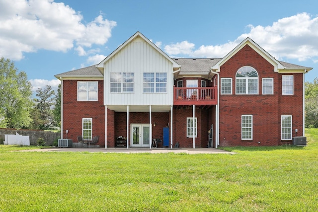 4025 Moore Hollow Rd, Woodlawn, TN 37191 - rear view of property with a lawn, a patio, central air condition unit, and french doors