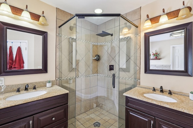4025 Moore Hollow Rd, Woodlawn, TN 37191 - full bath featuring two vanities, a stall shower, and a sink