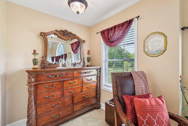 4025 Moore Hollow Rd, Woodlawn, TN 37191 - sitting room featuring light tile patterned floors, a healthy amount of sunlight, and baseboards