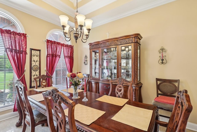 4025 Moore Hollow Rd, Woodlawn, TN 37191 - dining space with ornamental molding, an inviting chandelier, a wealth of natural light, and baseboards